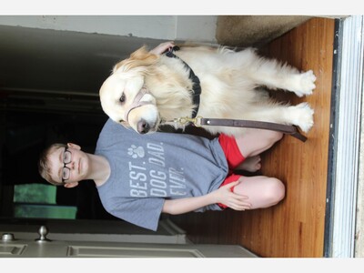 Local Boy With Autism Found Voice Through Service Animal