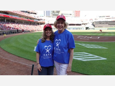 Warren County CASA volunteers deliver official game ball at Cincinnati Reds game